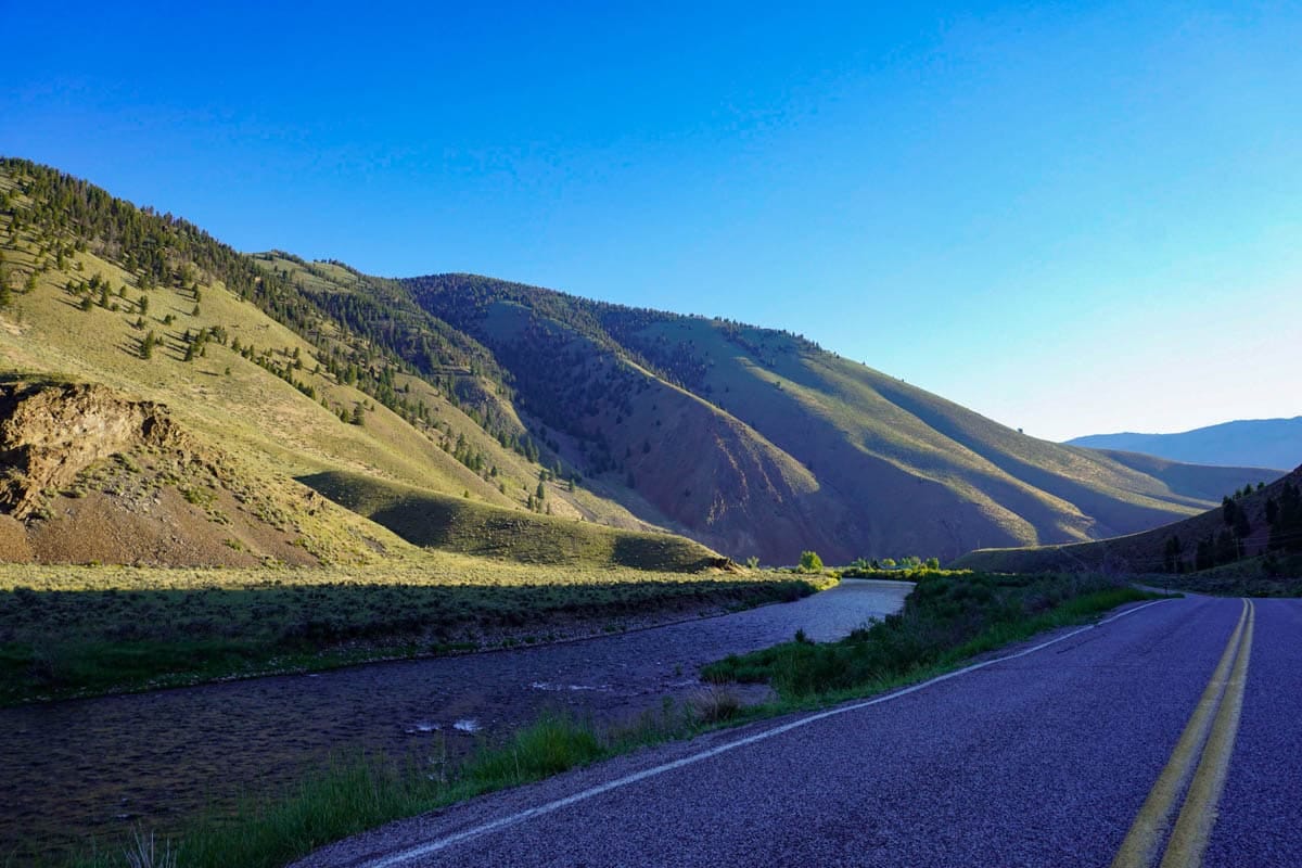 Rolling green hills along a road in Idaho